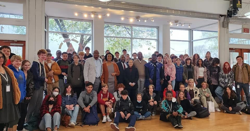Large youth group photo at a community gathering